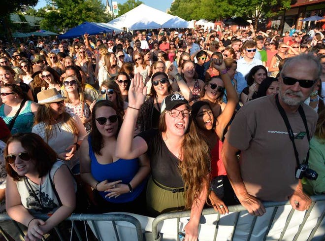 Fans dance as Judah and The Lion perform during the Athfest music festival on Friday, June 20, 2014, in Athens, Ga.  (Richard Hamm/Staff) OnlineAthens / Athens Banner-Herald
