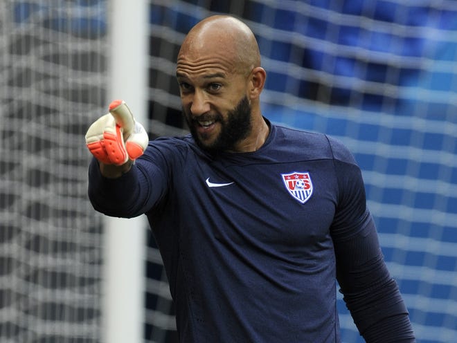US goalkeeper Tim Howard, above, will have to keep an eye on Portugal's Cristiano Ronaldo during Sunday's match in Manaus, Brazil.