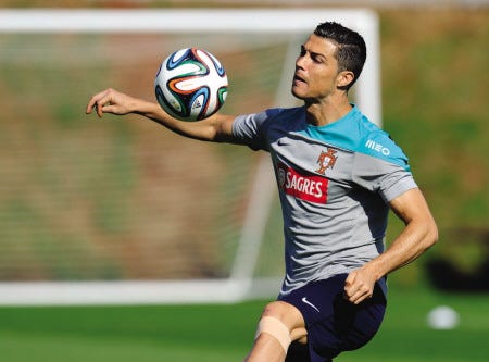 Cristiano Ronaldo controls the ball during a training session of Portugal in Campinas, Brazil on Friday. Portugal plays the United States on Sunday in the World Cup.