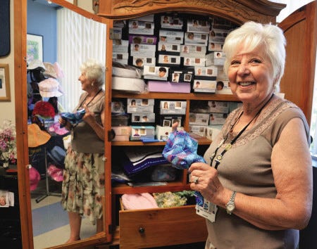 Jean Schulman, a former owner of a New York hair salon, is a volunteer in Portsmouth Regional Hospital's oncology department where she helps patients look their best while going through chemotherapy by cutting hair and fitting them with wigs, scarfs and hats.
