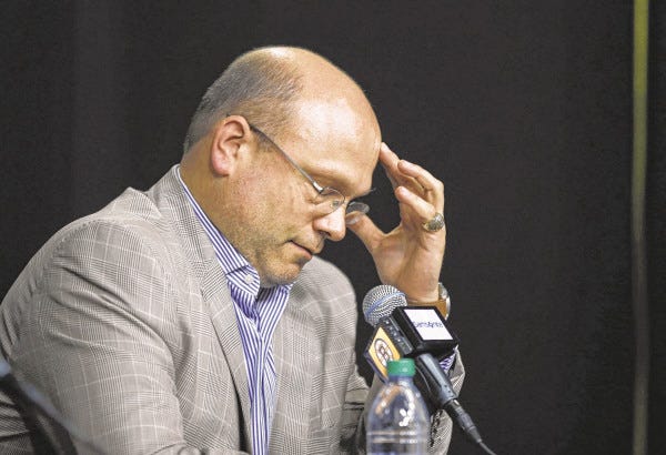 Boston Bruins General Manager Peter Chiarelli considers a question during a season-ending wrap-up news conference in Boston, Friday, May 16, 2014. The Montreal Canadiens eliminated the Bruins with a 3-1 win in Game 7 of their second-round Stanley Cup playoff NHL hockey series on Wednesday.