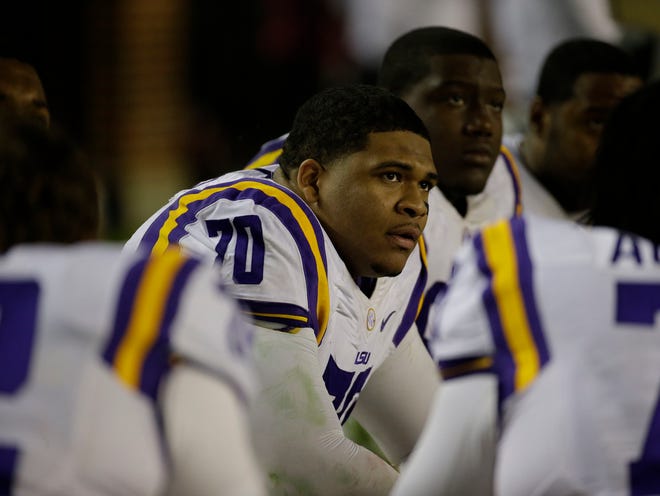 La’el Collins made the All-SEC second team last season after switching to left tackle for LSU. (Photo by The Associated Press)