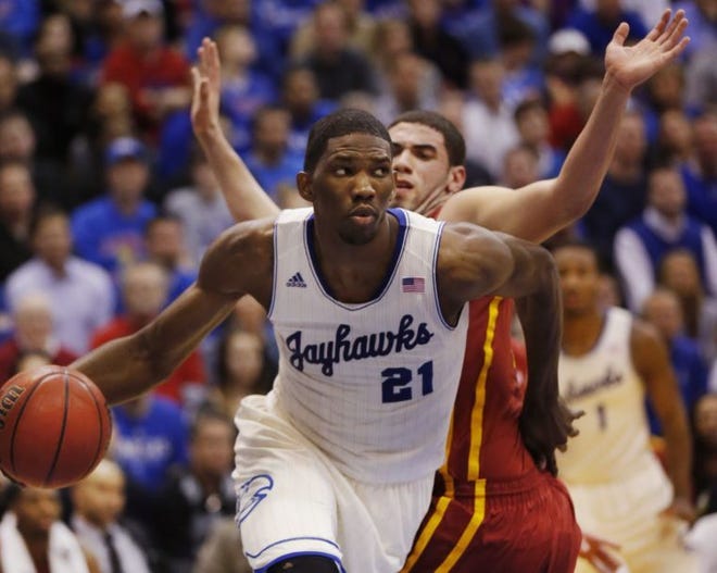 Kansas freshman center Joel Embiid drives to the basket during a January game.