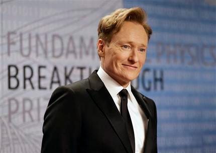 In this Dec. 12, 2013, file photo, talk show host Conan O'Brien arrives for the Breakthrough Prize in Life Sciences awards in Moffett Field, Calif. A home owned by O'Brien has been removed from a Rhode Island auction after he paid some back taxes on the property. Town officials tell the Westerly Sun that O'Brien paid his $8,000 bill on Friday, June 20, 2014.