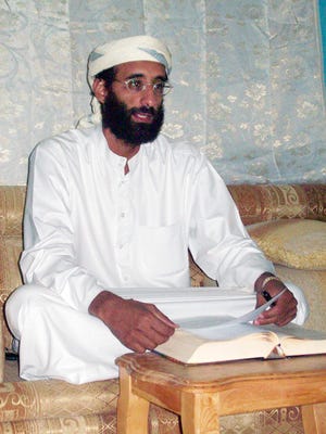 This October 2008 file photo shows Imam Anwar al-Awlaki in Yemen. A federal appeals court on Monday released a previously secret memo that provided legal justification for using drones to kill Americans suspected of terrorism overseas. The memo pertained specifically to the September 2011 drone-strike killing in Yemen of Anwar Al-Awlaki, an al-Qaida leader who had been born in the United States. AP PHOTO/MUHAMMAD UD-DEEN
