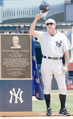 Rich 'Goose' Gossage tips his cap after unveiling his own Monument Park plaque during Old Timers' Day ceremonies Sunday prior to the New York Yankees' game against the Baltimore Orioles.



AP Photo/Kathy Willens