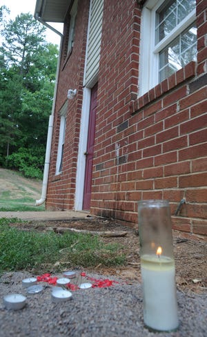 The spot where Timothy Blair, 27, was shot and killed outside near the back door of his Connecticut Village apartment in Gaffney on Sunday afternoon.