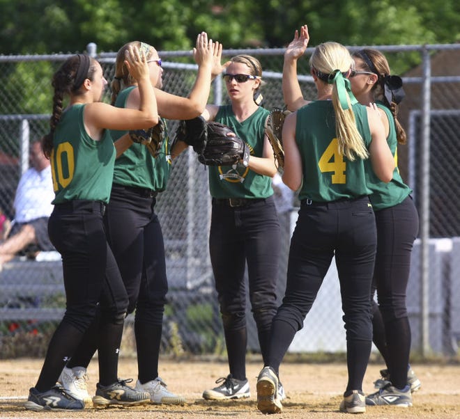 Mercer County softball players congratulate each other after an out in the Carpenter Cup against the Suburban One League/Bicentennial Athletic League at FDR Park in Philadelphia, Monday, June 23, 2014.