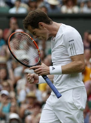 Andy Murray reacts  during his first-round match against David Goffin at the All England Lawn Tennis Championships at Wimbledon on Monday.