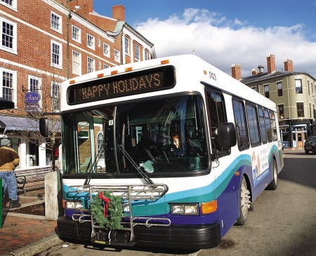 The Cooperative Alliance for Seacoast Transportation (COAST) bus makes a stop recently in Portsmouth’s Market Square during one of the many routes in the Seacoast area.