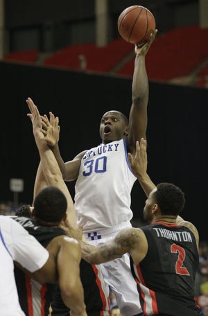 Kentucky forward Julius Randle (30) goes up for a shot during the SEC Tournament in March.