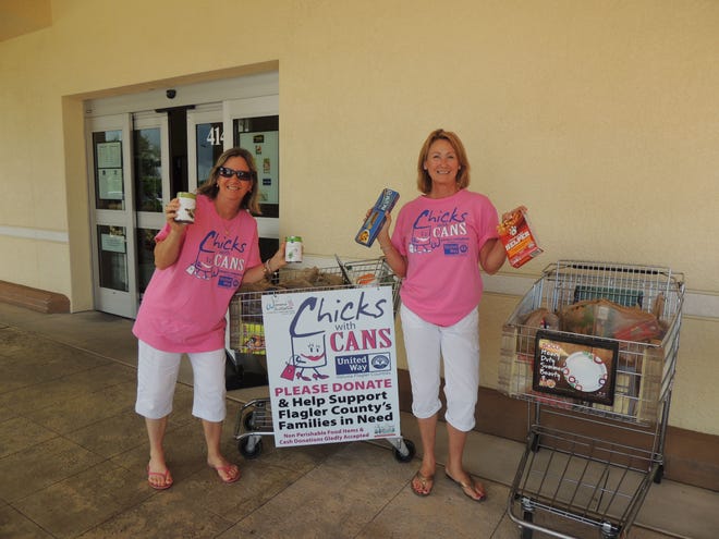 Val Sanson, left, and Mary Ruppel worked hard to fill up the shopping carts at the Flagler Beach Publix.