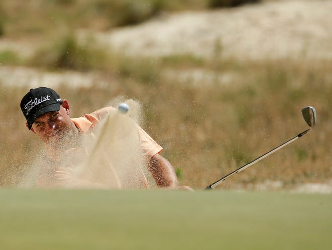 Greenville resident Bill Haas hits from the bunker during the U.S. Open earlier this month.