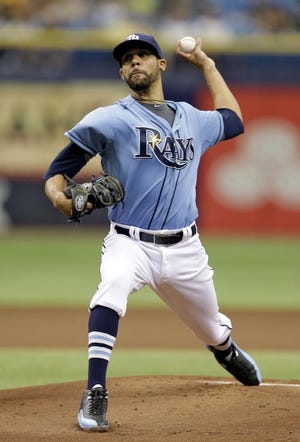 Tampa Bay pitcher David Price  delivers a pitch against the Pittsburgh Pirates during the first inning of the Rays' 5-1 win on Wednesday at Tropicana Field.