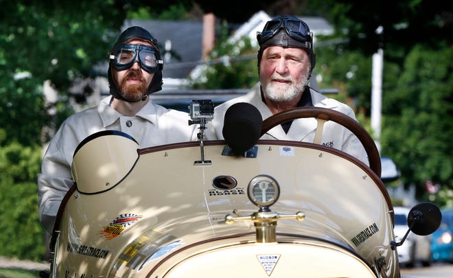 Navigator Chris Clark, left, of Ansonia, Conn., and driver Frank Buonanno, of Newtown, Conn., take part in the Great Race, Saturday in Ogunquit, Maine.
