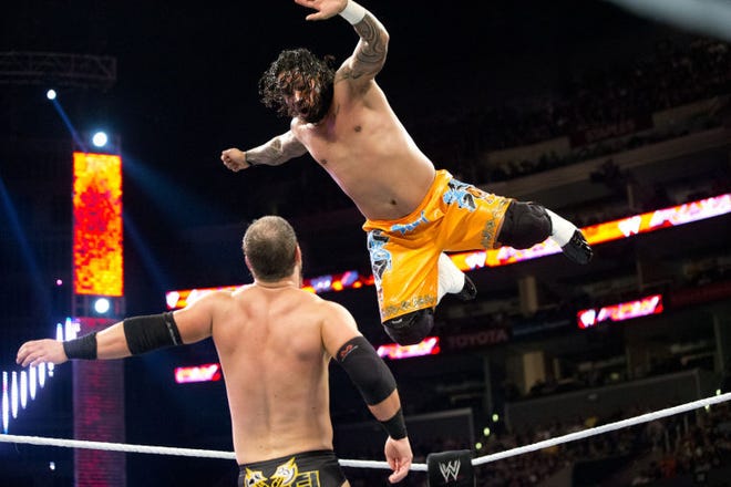 Jey Uso, shown hitting Curtis Axl with a cross body block, is excited to fly into Voorhees and Wildwood on July 13.