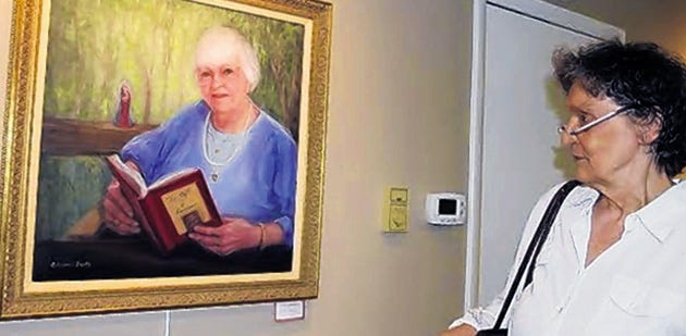 Poet Lorraine Davis, who recently published a book of poems titled "Going Back to Retrieve It" was struck by Elaine Sopko's painting of her aunt, "Cordelia and Her Pearls."