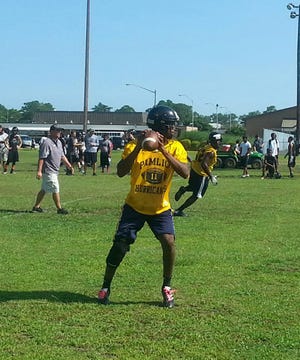 Pamlico rising junior Josiah Simmons drops back to pass during the Hurricanes’ 7-on-7 passing league game at Havelock on Thursday. Simmons is projected to begin the season at Pamlico’s starting quarterback.