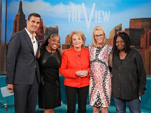 This undated photo released by ABC shows, from left, Bill Rancic, Sherri Shepherd, Barbara Walters, Jenny McCarthy, and Whoopi Goldberg, on "The View," which airs Monday-Friday (11:00 am-12:00 pm, ET) on the ABC Television Network. Shepherd says she's leaving ABC's daytime talk show "The View" after seven years. In a statement Thursday, June 26, 2014, Shepherd says that after "careful consideration" she has decided it's time to move on. (AP Photo/ABC, Lou Rocco)