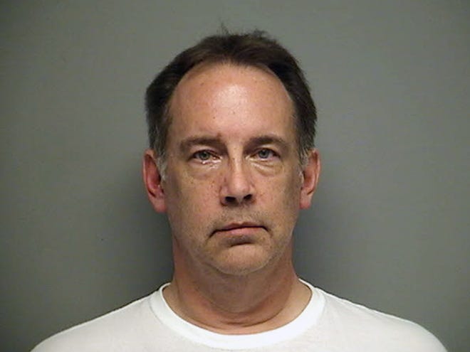 In this undated booking photo released by Walworth County Sheriff's Office, Steven Zelich is seen. The former police officer has been charged Thursday with hiding a corpse after the bodies of two women were found stuffed in suitcases deposited along a rural road in Wisconsin.