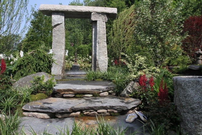 The theme of this year’s Newport Flower Show, “Journey: Grand Vistas,” pays homage to European garden and landscape design. The above display was designed created by Magma Design Group Inc.