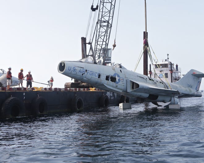 Two F-101 Voodoo planes make their last journey 75 feet deep into the Gulf to become artificial reefs about 3 nautical miles from the M.B. Miller County Pier in Panama City Beach.