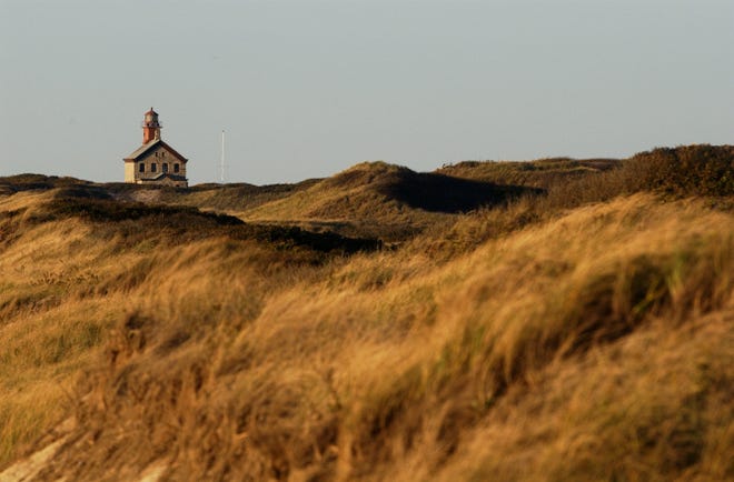 North Lighthouse, built in 1867, rises from the autumn sea grass at the 127-acre Block Island National Wildlife Refuge, near Sandy Point.