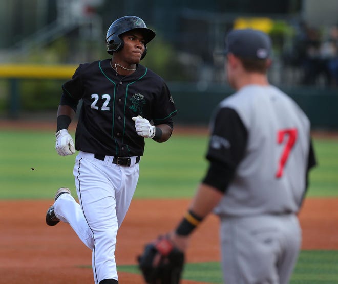 Franchy Cordero rounds the bases after his two-run home run in the first inning of the Emeralds’ game against the Volcanoes on Friday night at PK Park. Eugene lost 5-4 in 14 innings. (Brian Davies/The Register-Guard)