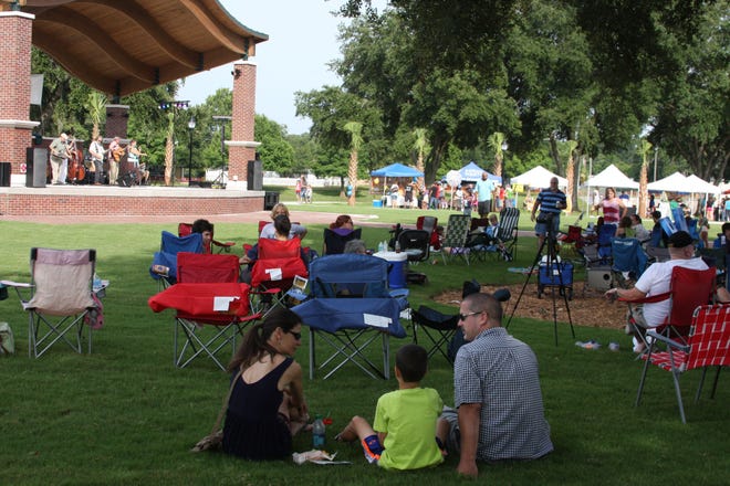 Families celebrate the opening of the renovated Earl Brown Park on Saturday in DeLand.