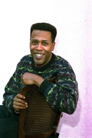 In this Jan. 30, 1989, file photo, actor Meshach Taylor poses during an interview in Los Angeles. Taylor's agent says the actor, who appeared in the hit sitcoms "Designing Women" and "Dave's World," died of cancer on Saturday at his home in Los Angeles. He was 67.