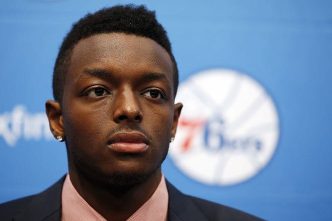 Sixers rookie Jerami Grant listens to a question during Saturday's introductory news conference.