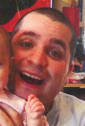 This undated file photo submitted into evidence by defense attorney Julia L. Gatto shows New York City police Officer Gilberto Valle. A federal judge, late Monday, June 30, 2014, overturned Valle's kidnapping conspiracy conviction.
