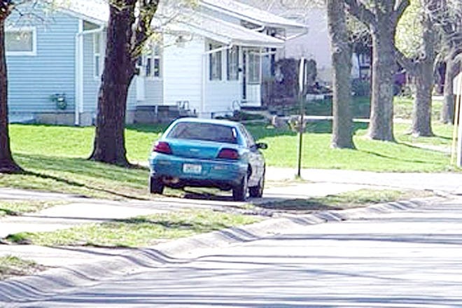 The city is reminding residents to avoid parting on the grass in the front yard or over the sidewalk. Courtesy photo