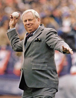 New York Mets general manager Frank Cashen throws out the first ball during the opening day ceremonies at New Yorkís Shea Stadium. The Mets say Cashen has died. He was 88.