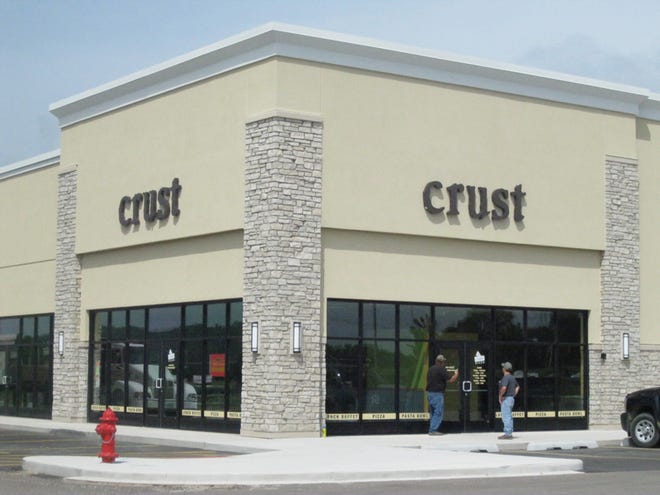 Crust is located at 322 W. Washington St. Owner Kelly Couri of Washington started Firehouse Pizza in Peoria. He said Crust is Firehouse Pizza with a twist.