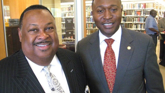 Larry Earvin and Roderick Smothers at Huston-Tillotson University’s pre-Juneteenth benefit.