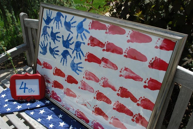 To commemorate Independence Day, Cristin Drewes created a family memento in the shape of a flag out of her children's painted hands and feet.