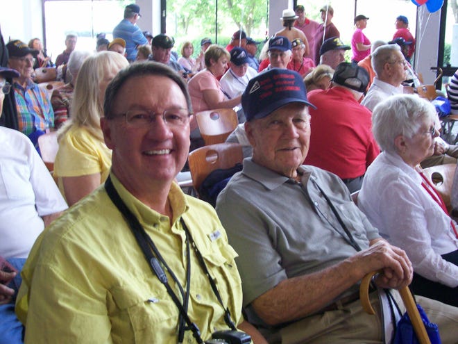 Edwin Kendrick, right, and his son, Gary, wait to go on a D-Day anniversary trip to the D-Day memorial in Bedford, Va. Because of the trip, an online European newspaper got Edwin's name and interviewed him about the Normandy invasion. Photo submitted by Vicki Kendrick