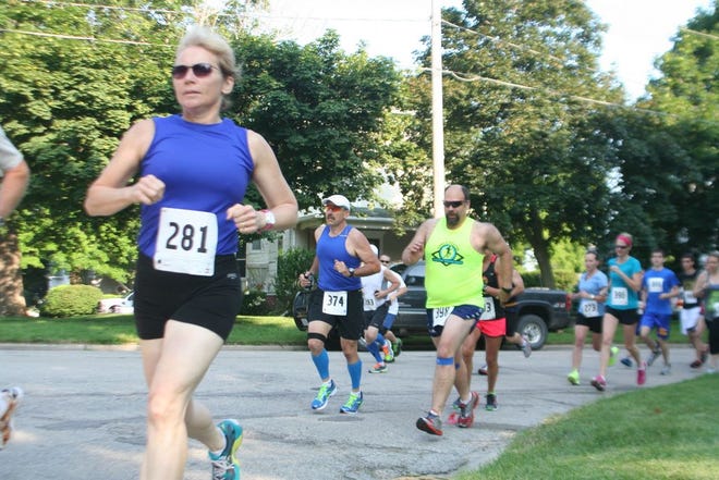 Runners make the turn at the southwest corner of Wiley Park during the 2013 Galva Freedom Fest 5K.