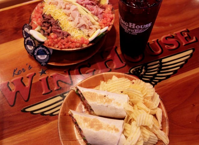 Ker's WingHouse in Lakeland, among other dishes, offers a chef salad and a Winghouse Wrap, roast beef, turkey, ham, diced tomatoes, lettuce and cheese. The Largo-based sports-themed restaurant chain is being sold.