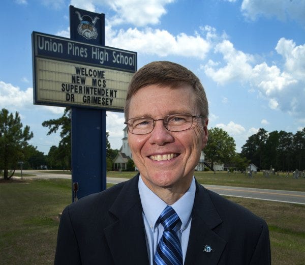 Bob Grimesey Jr. was the superintendent of Moore County schools.