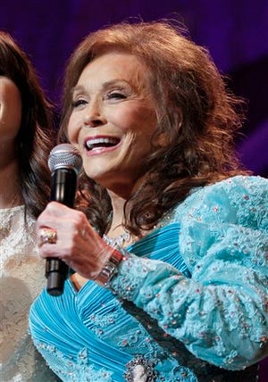 Country music star Loretta Lynn performs at the Grand Ole Opry in Nashville, Tennessee on May 10, 2012. Lynn, along with Jackson Browne, conjunto musician Flaco Jimenez and blues musician Taj Mahal will receive lifetime achievement awards at this year's Americana Music Association Honors and Awards ceremony this September in Nashville.