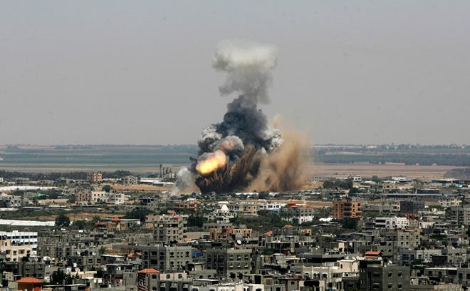 Smoke and fire rise from an Israeli missle strike in Rafah on Tuesday.