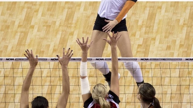 Texas’ Amy Neal goes up for a kill during the NCAA Final Four in 2013 in Seattle, Washington. Neal is preparing for her junior season at Texas.