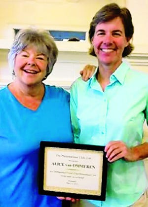 Alice van Ommeren, right, received a Distinguished Friend of the Philomathean Club award later in the week from Mary Jo Gohlke.