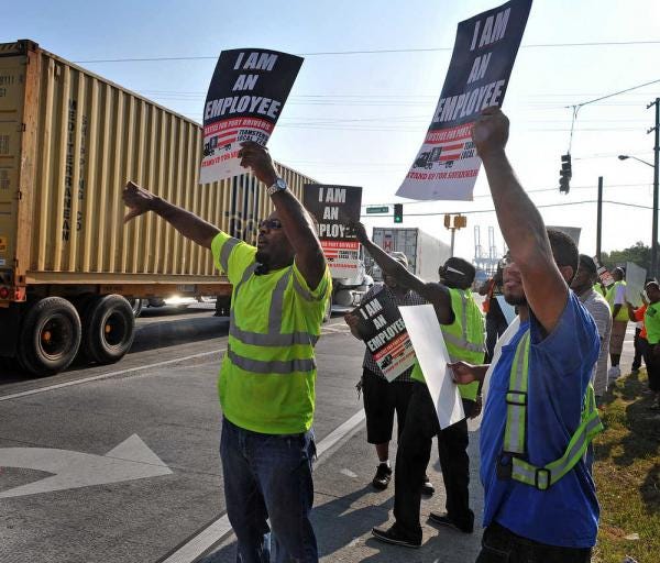 Steve Bisson/Savannah Morning News file photoTruckers at the entrance of the Georgia Ports Authority's Garden City Terminal on Ga. 307 were protesting what they call the injustices in pay for the short haul truck drivers.