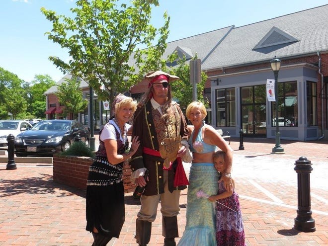 Volunteers for the first Mashpee Pirate Palooza 2013: The Pirate is Frank Flanagan (Walgreens), The blonde with the mermaid costume is Carol Sherman ( Mashpee Selectman), the little girl is Emma Sherman Carol's granddaughter and the other woman is Linda Steele (Cape Cod 5).