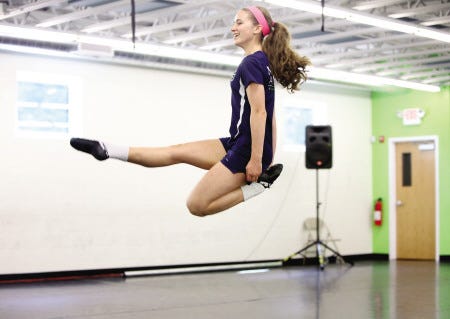 Kate Babcock, 16, demonstrates a leap in Irish step dancing at Murray Dance Studio in Exeter. The teen came in sixth place in the World Irish Dance Championships held in London in April.