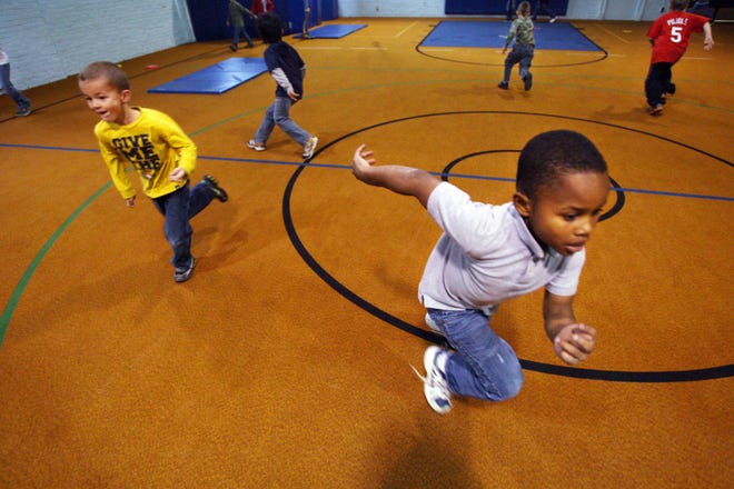 Students sprint around the gym during physical education class at Dubois Elementary School in 2011. The Springfield Collaborative aims to curb the trend of childhood obesity and prevent overweight children from becoming obese adults.