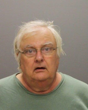 Police say Robert Augustine, a 67-year-old Taunton man, allegedly robbed two banks within 15 minutes on Saturday afternoon, before he was arrested at his public housing apartment on Olney Street.